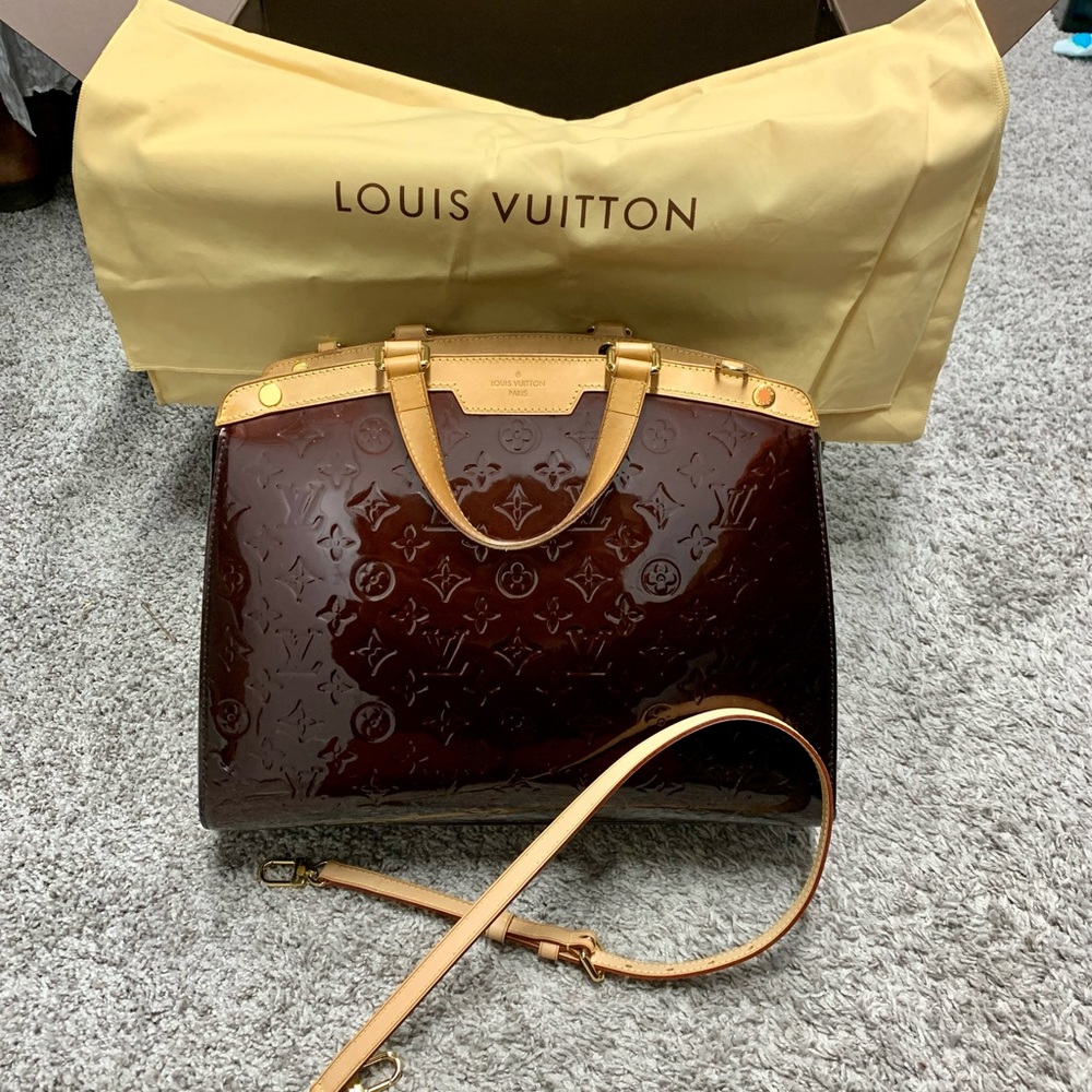 Authentic Louis Vuitton Vernis Brea GM bag in Amarante